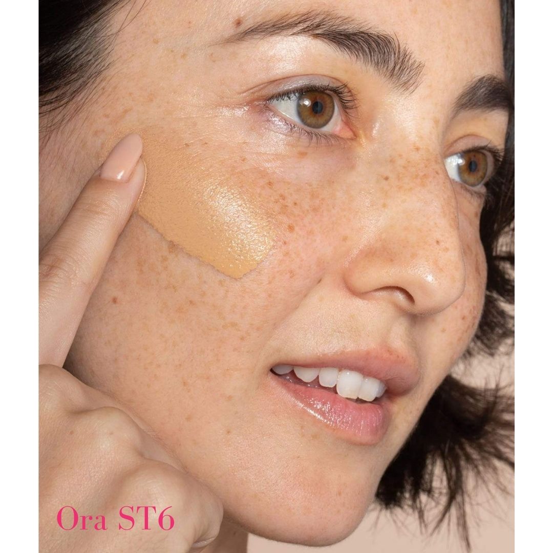 ILIA Super Serum Skin Tint SPF 40 ST6 Ora: (for light skin with warm undertones) on model - AILLEA